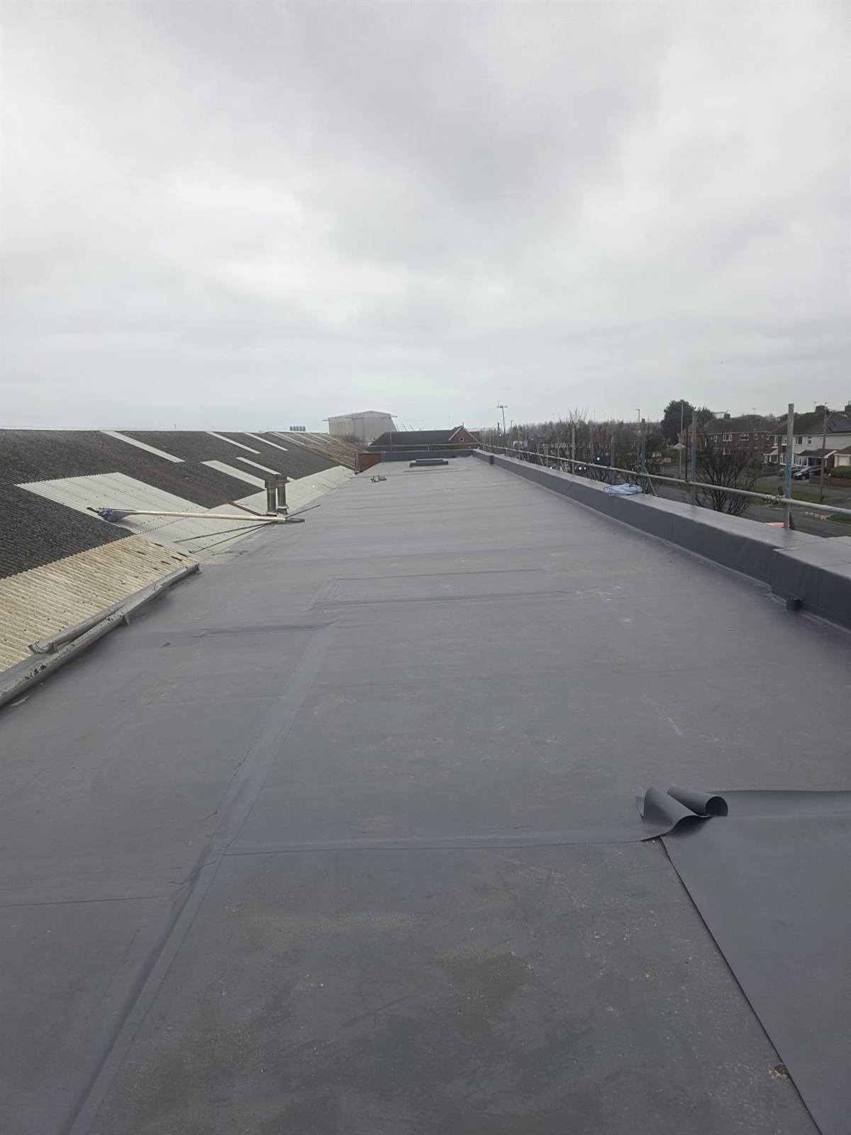 1,400 m² Fatra single-ply commercial roof overlay, Suits Direct Hartlepool